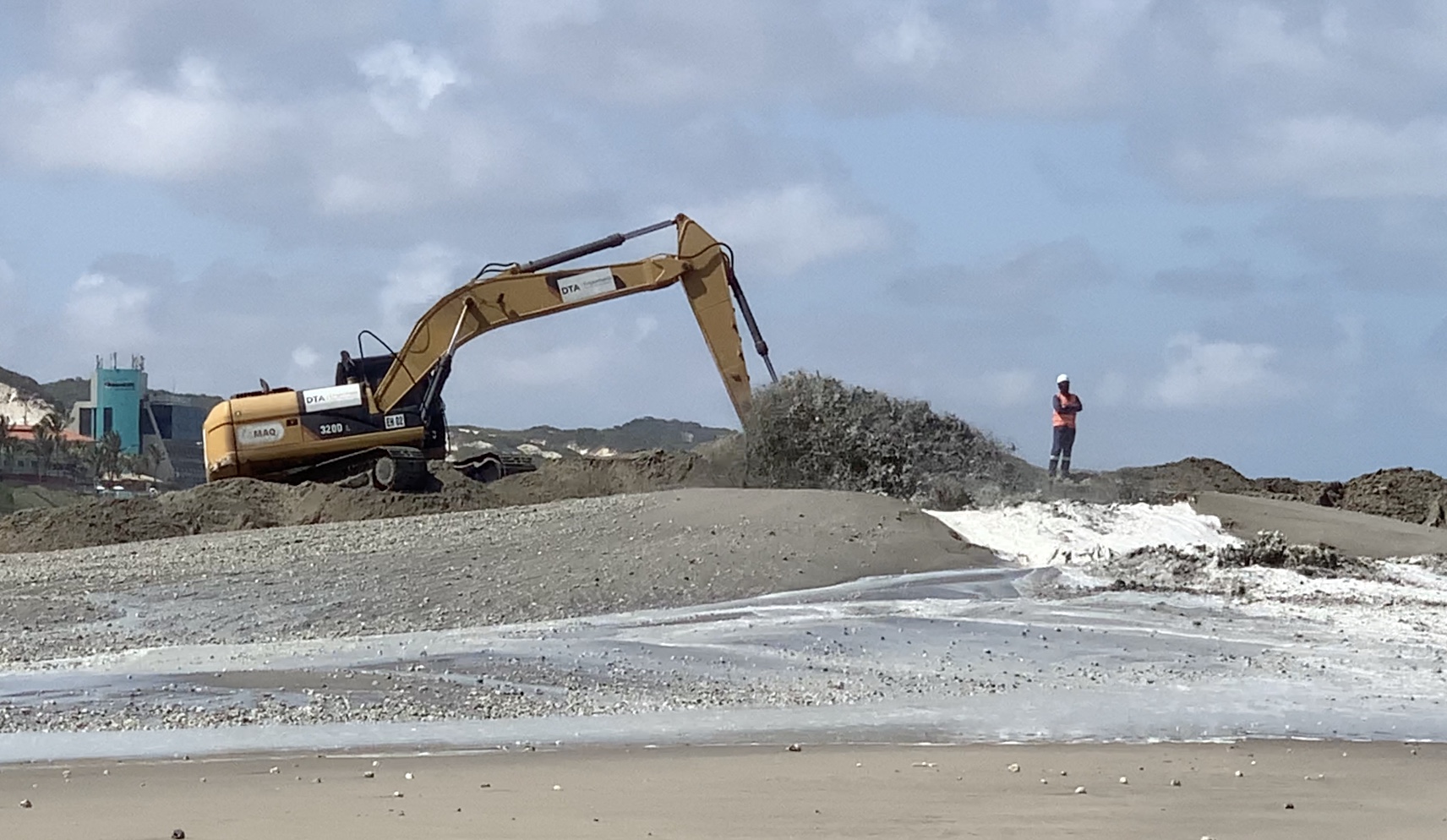 Pumping of sand on to beach